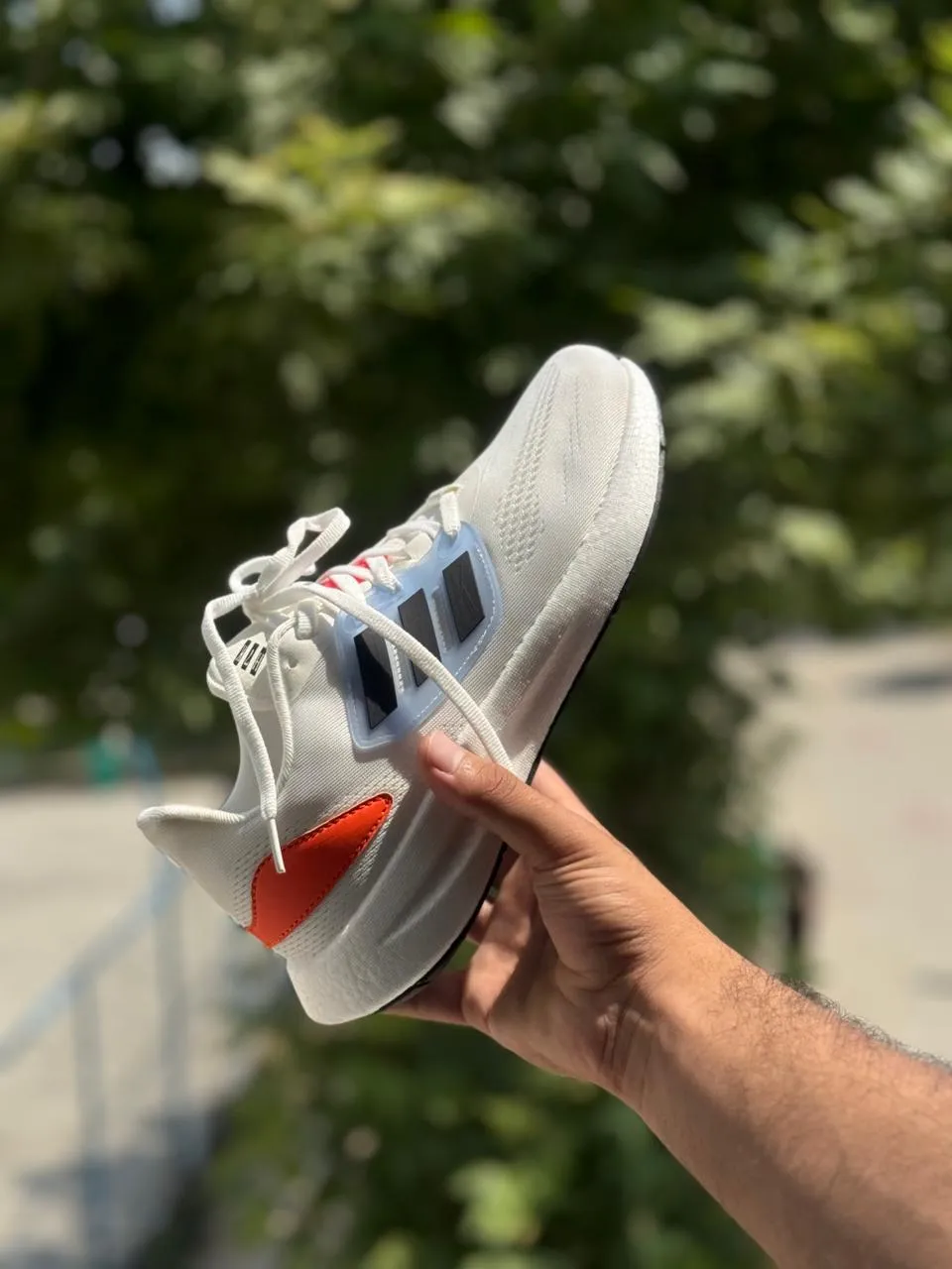 Side view of Adidas pureboost 22 Cloud-White
