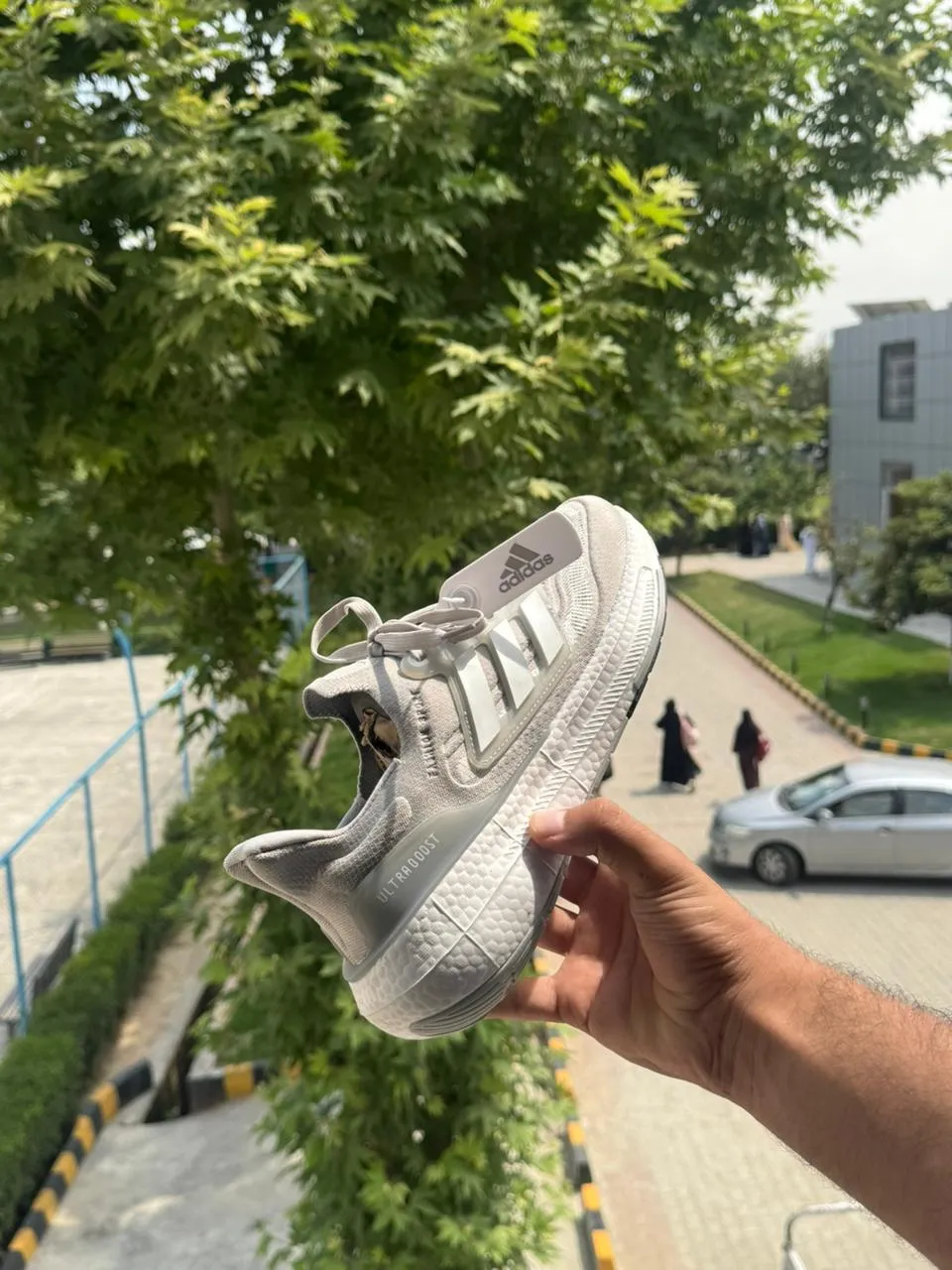 Side view of Adidas Ultraboost Light - Halo Silver / Cloud White